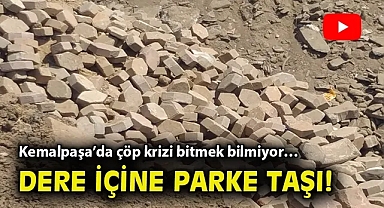 Kemalpaşa'da çöp krizi bitmek bilmiyor… Dere içine parke taşı!