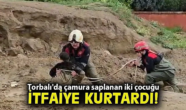 Torbalı'da çamura saplanan iki çocuğu itfaiye kurtardı